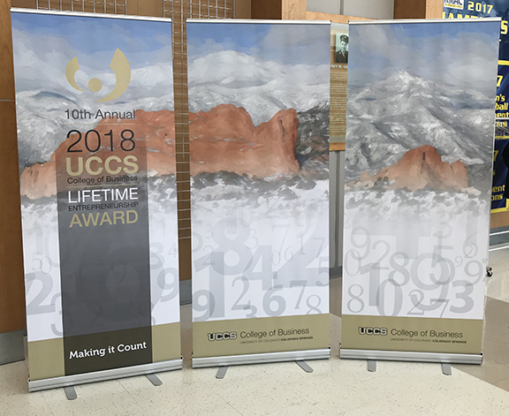 3 banner stands for UCCS LEA award luncheon