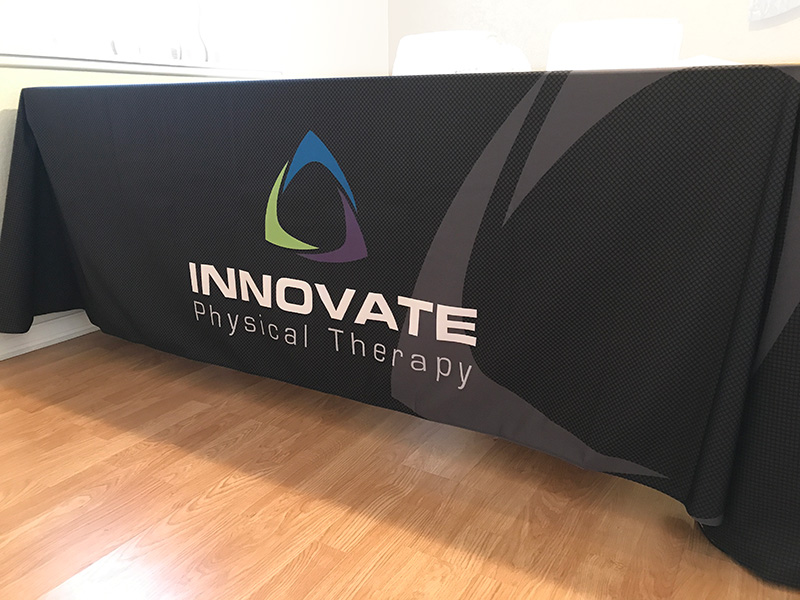 full color custom imprinted table throw for Innovate Physical Therapy