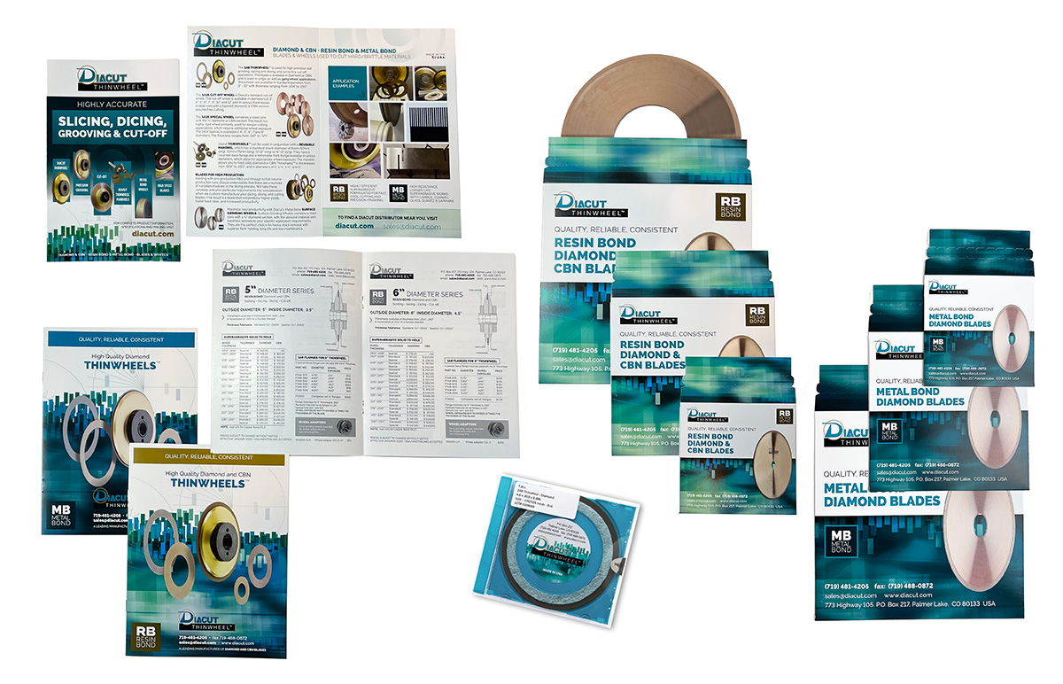 Marketing collateral for Diacut Inc. including price catalogs, mailers, cutting blade sleeves, and stickers