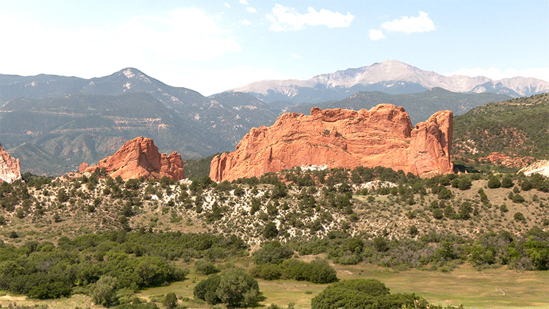 daytime view looking west of Garden of the Gods and Pikes Peak in Colorado Springs